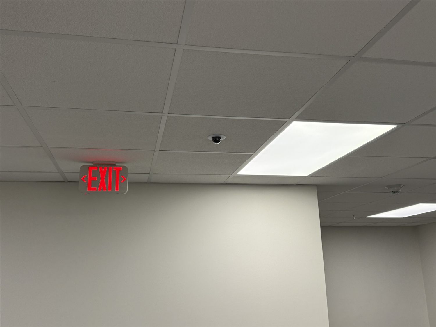 Ceiling-mounted dome security camera installed in an office near Rockford, IL